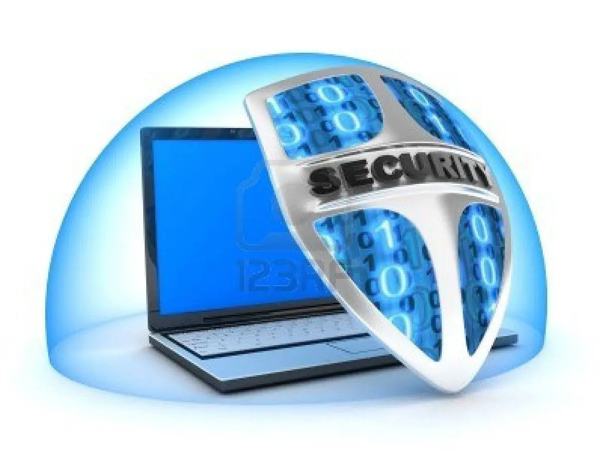 modern laptop shielded by a security emblem, highlighting the importance of data protection.