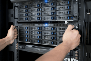 technician performing server maintenance in a modern data center for optimal network performance.