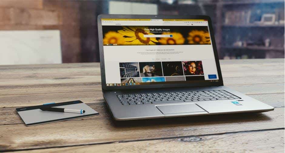 creative workspace featuring a laptop and tablet for digital media and artistic exploration.