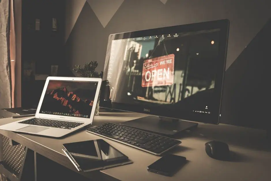 5 Monthly Maintenance Steps For Your Laptop Or Computer 1 sleek modern workspace with laptop, desktop monitor, and organized tech for productivity and creativity.