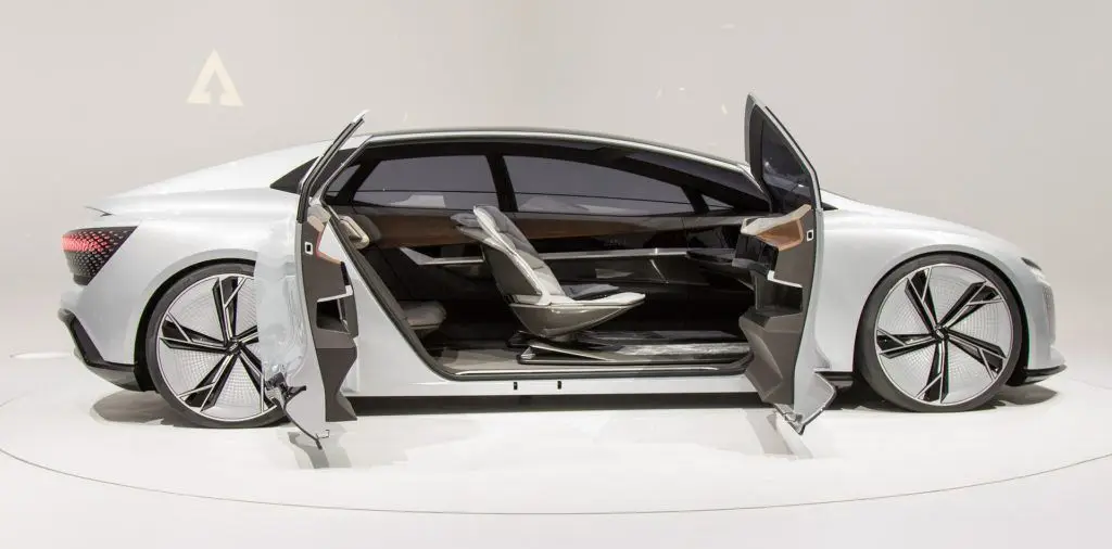 futuristic silver concept car with advanced technology and luxury interior, showcasing innovative design.
