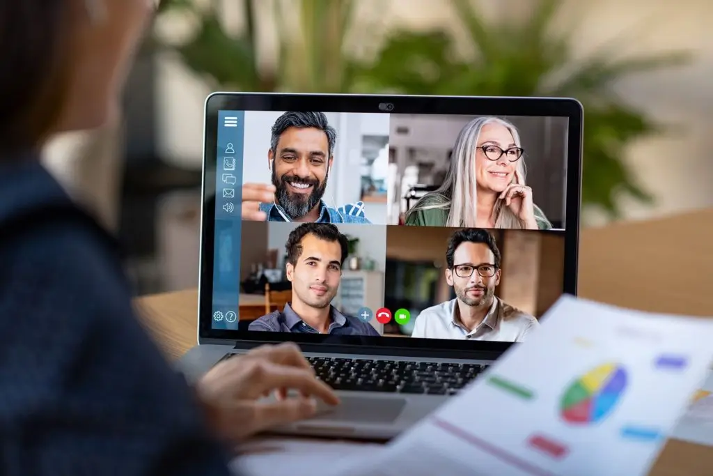 dynamic virtual meeting with professionals collaborating on data-driven insights for successful teamwork.